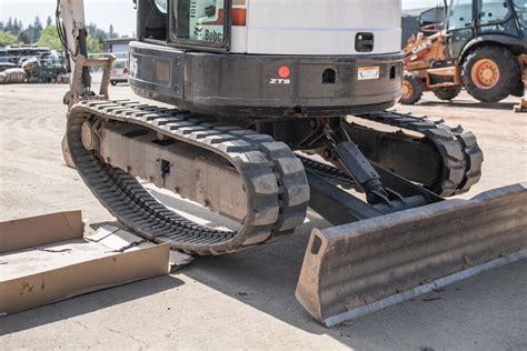 how to install rubber track on mini excavator|aftermarket rubber tracks.